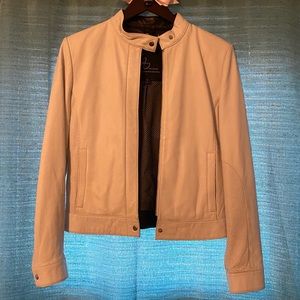 Wilson’s white leather jacket